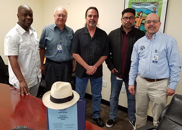 Local 54's negotiating team after reaching a record two-day contract in 2019.